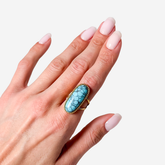 Gold-Plated Titanium Light Blue Ring with Light Blue Stones