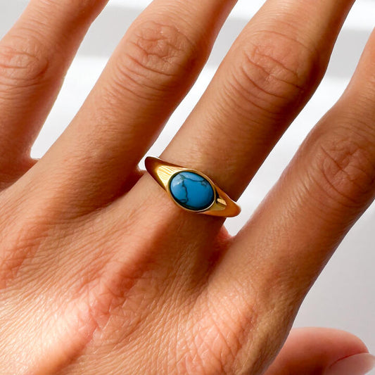 Gold-Plated Titanium Light Blue Ring with Light Blue Stones
